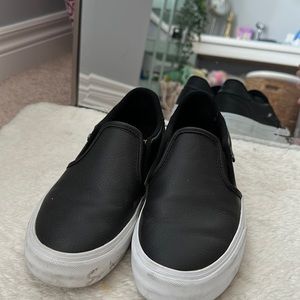 Basically new, slip on leather vans shoes. WILL CLEAN IF SOLD. Deluxe comfort.